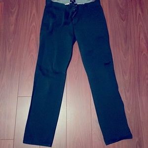Navy blue khaki pants that I loved but grew out of.